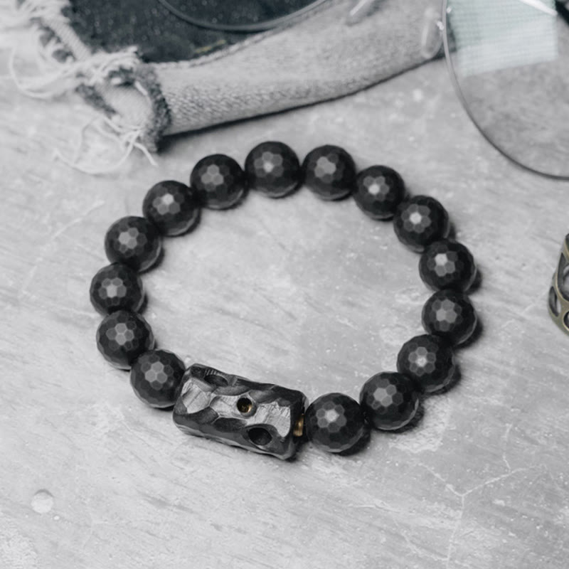 Bransoletka ochronna Buddha Stones z matowej, mrożonej powierzchni i czarnego onyksu z hebanu