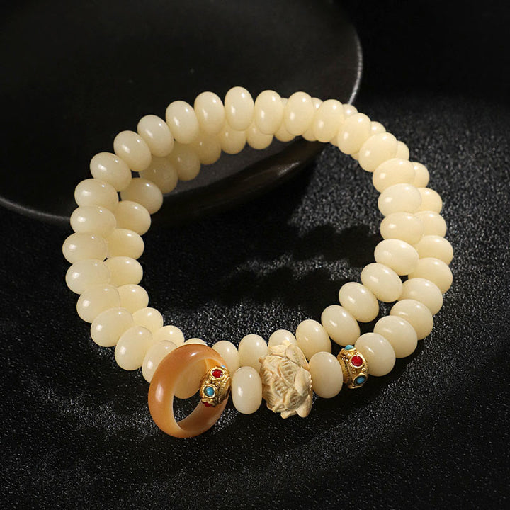 Bransoletka Buddha Stones Bodhi Seed Peach Wood Lotus Wealth Double Wrap