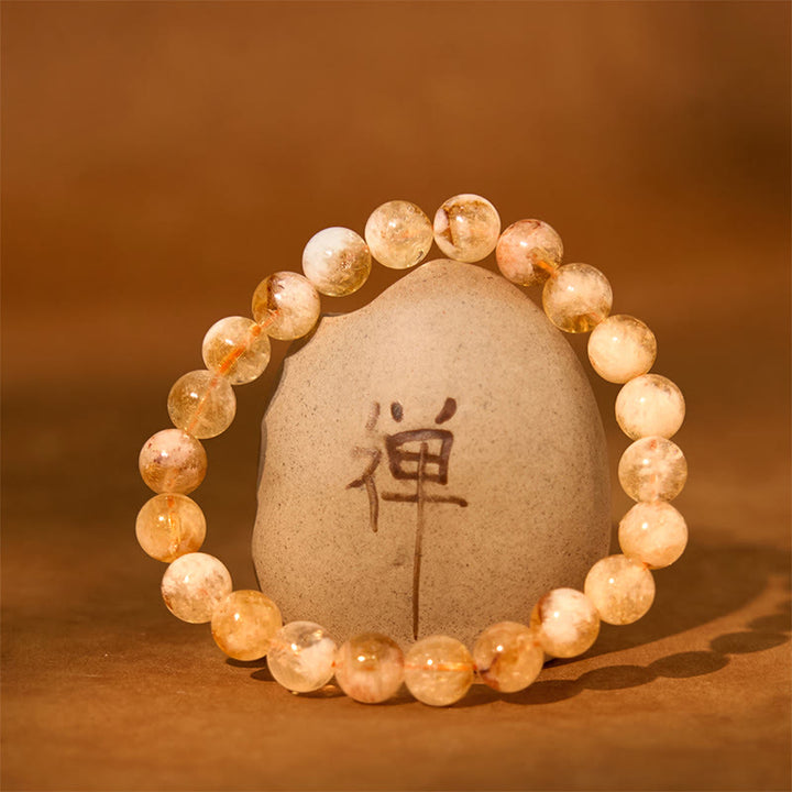 Bransoletka z kryształu naturalnego cytrynu i płatków śniegu z Buddha Stones