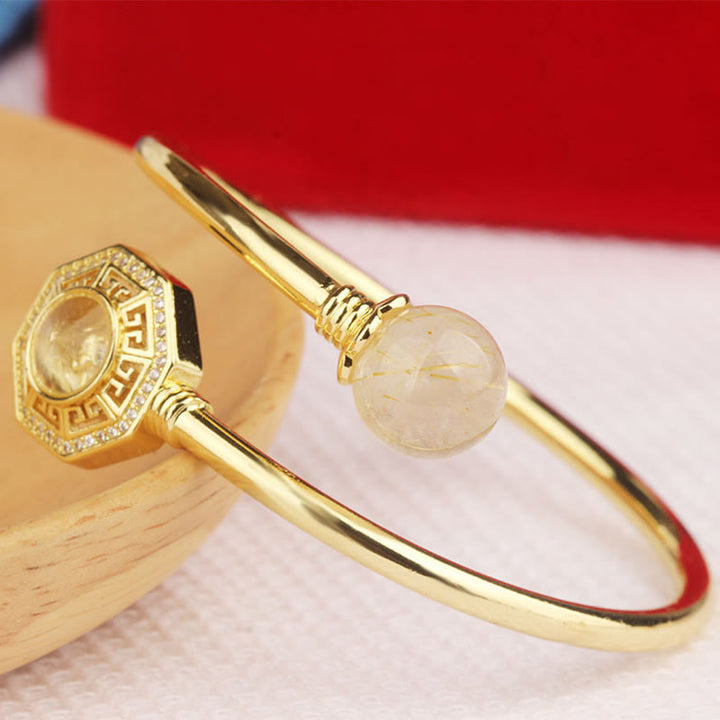 Buddha Stones Rutilated Quartz Miedź Mosiądz Obrotowy Wiatrak Feng Sheng Shui Qi Odwaga Bransoletka Bangle