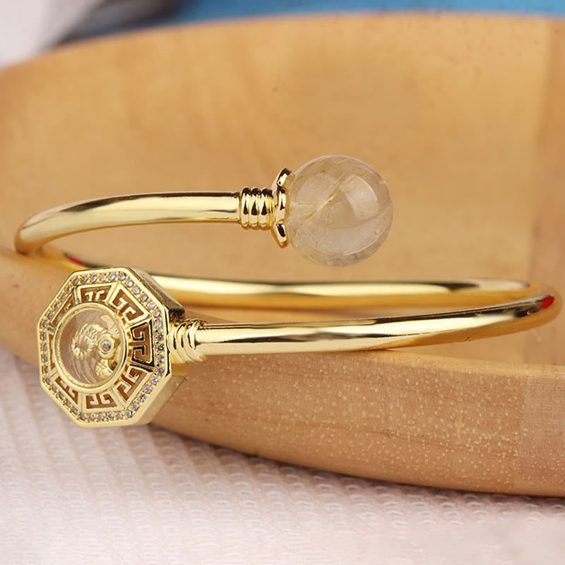 Buddha Stones Rutilated Quartz Miedź Mosiądz Obrotowy Wiatrak Feng Sheng Shui Qi Odwaga Bransoletka Bangle