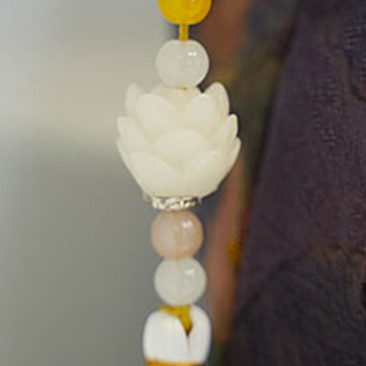 Buddha Stones Lotos Bambus Żuraw Jeleń Motyl Góra Xiangyunsha Jedwab Piosenka Brokatowa Torba Crossbody Torba na Ramię
