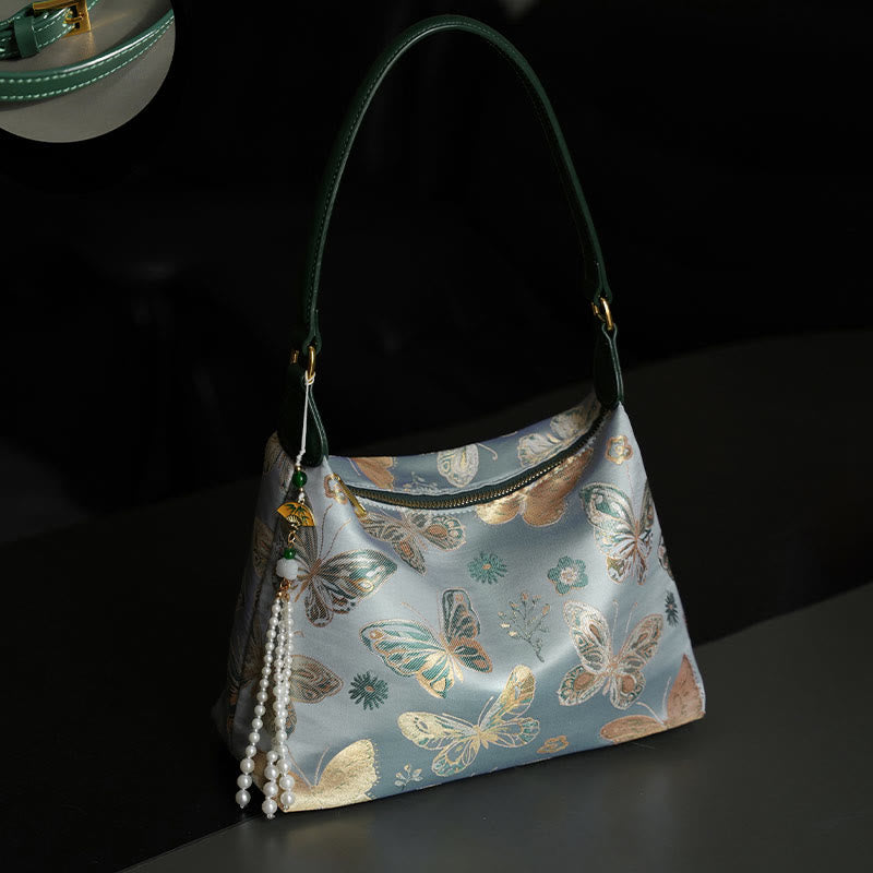 Buddha Stones Lotos Bambus Żuraw Jeleń Motyl Góra Xiangyunsha Jedwab Piosenka Brokatowa Torba Crossbody Torba na Ramię
