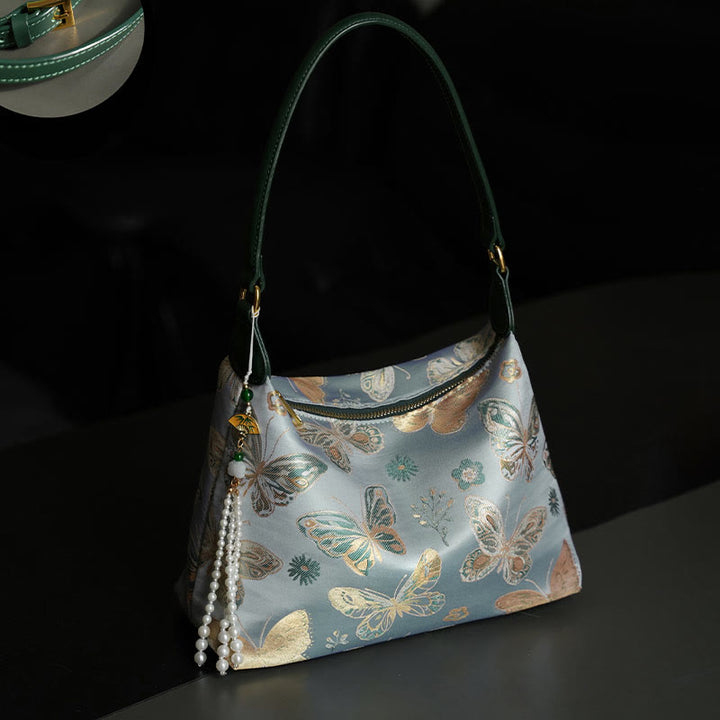 Buddha Stones Lotos Bambus Żuraw Jeleń Motyl Góra Xiangyunsha Jedwab Piosenka Brokatowa Torba Crossbody Torba na Ramię
