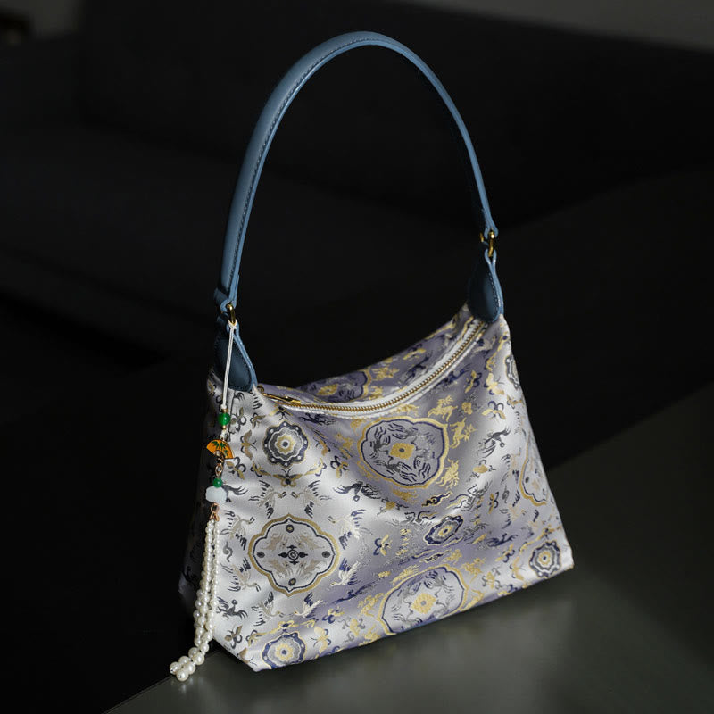 Buddha Stones Lotos Bambus Żuraw Jeleń Motyl Góra Xiangyunsha Jedwab Piosenka Brokatowa Torba Crossbody Torba na Ramię
