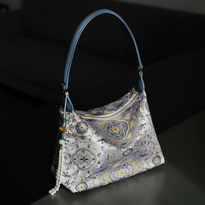 Buddha Stones Lotos Bambus Żuraw Jeleń Motyl Góra Xiangyunsha Jedwab Piosenka Brokatowa Torba Crossbody Torba na Ramię