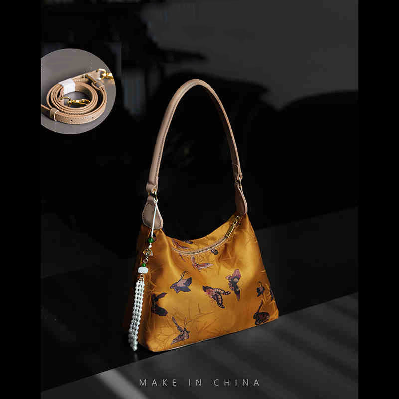 Buddha Stones Lotos Bambus Żuraw Jeleń Motyl Góra Xiangyunsha Jedwab Piosenka Brokatowa Torba Crossbody Torba na Ramię