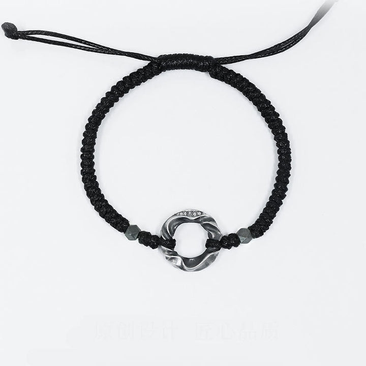 Bransoletka ochronna Buddha Stones ze srebra próby 999 Peace Buckle z czarnej woskowanej liny