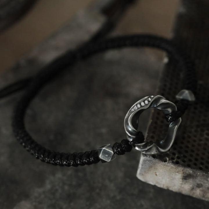 Bransoletka ochronna Buddha Stones ze srebra próby 999 Peace Buckle z czarnej woskowanej liny