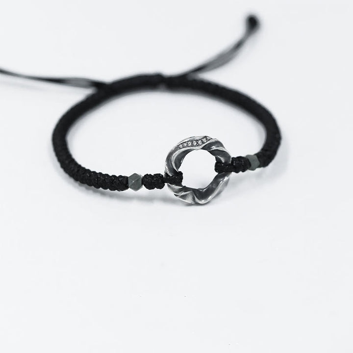 Bransoletka ochronna Buddha Stones ze srebra próby 999 Peace Buckle z czarnej woskowanej liny