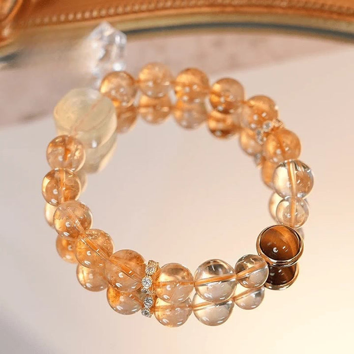 Bransoletka Buddha Stones Topaz Cytryn Tygrysie Oko Zakiram Bogini Bogactwa