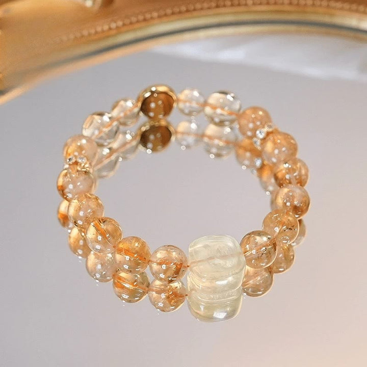 Bransoletka Buddha Stones Topaz Cytryn Tygrysie Oko Zakiram Bogini Bogactwa
