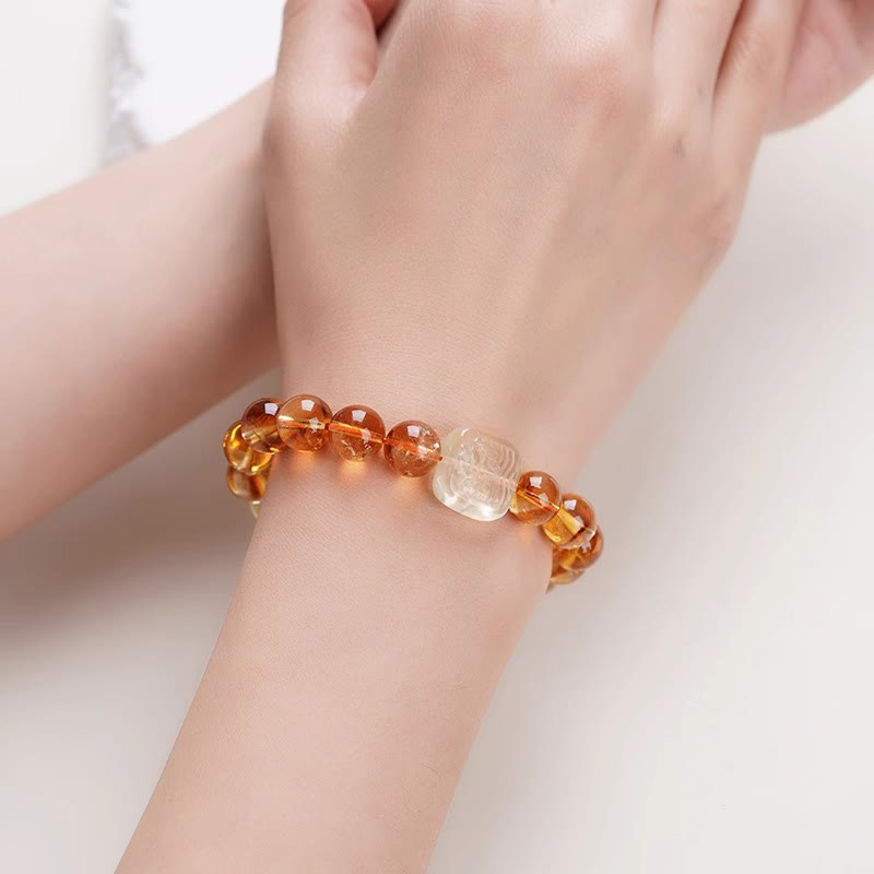 Bransoletka Buddha Stones Topaz Zashi Lhamo Kindness