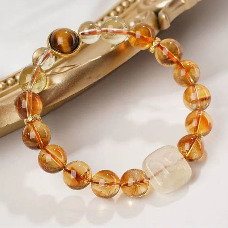 Bransoletka Buddha Stones Topaz Zashi Lhamo Kindness