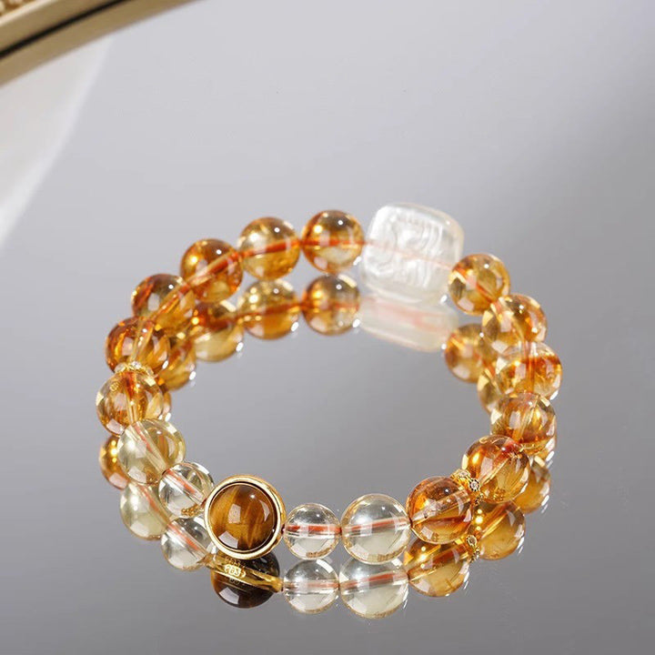 Bransoletka Buddha Stones Topaz Zashi Lhamo Kindness