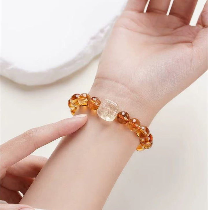 Bransoletka Buddha Stones Topaz Zashi Lhamo Kindness