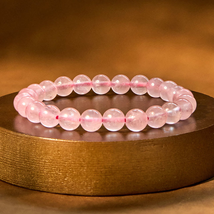 Bransoletka energetyczna uzdrawiająca z różowego kwarcu i Buddha Stones