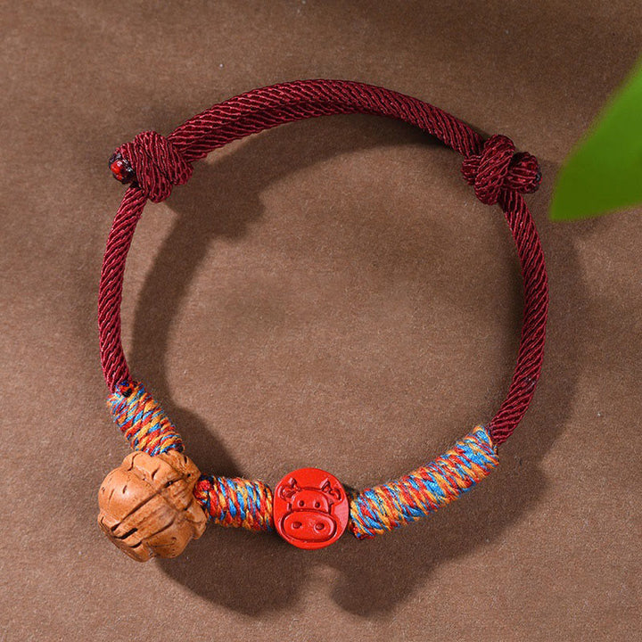 Buddha Stones Ręcznie robione Chińskie Zodiak Czerwony Sznurek Brzoskwiniowy Cynober Bransoletka Szczęścia