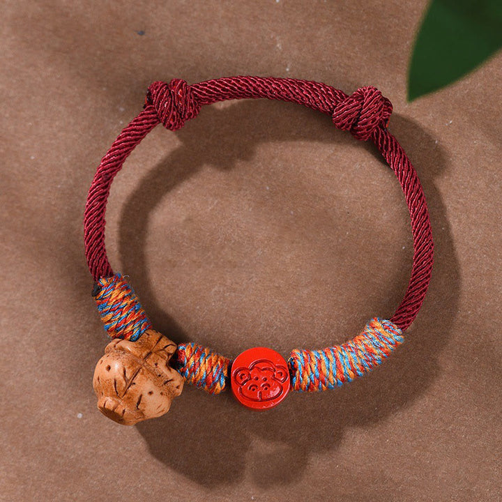 Buddha Stones Ręcznie robione Chińskie Zodiak Czerwony Sznurek Brzoskwiniowy Cynober Bransoletka Szczęścia