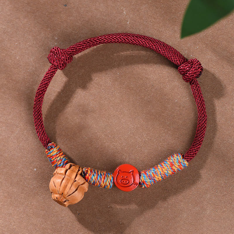 Buddha Stones Ręcznie robione Chińskie Zodiak Czerwony Sznurek Brzoskwiniowy Cynober Bransoletka Szczęścia