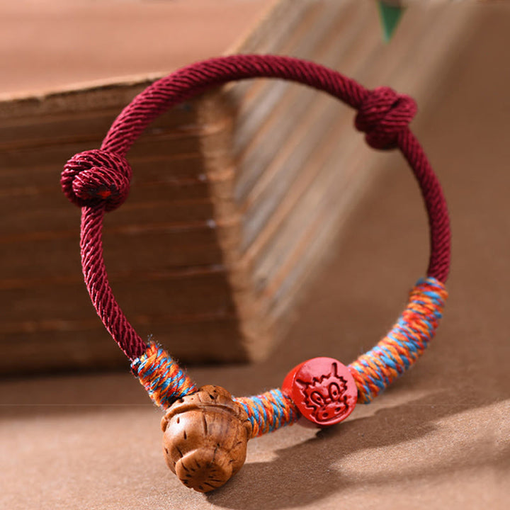 Buddha Stones Ręcznie robione Chińskie Zodiak Czerwony Sznurek Brzoskwiniowy Cynober Bransoletka Szczęścia