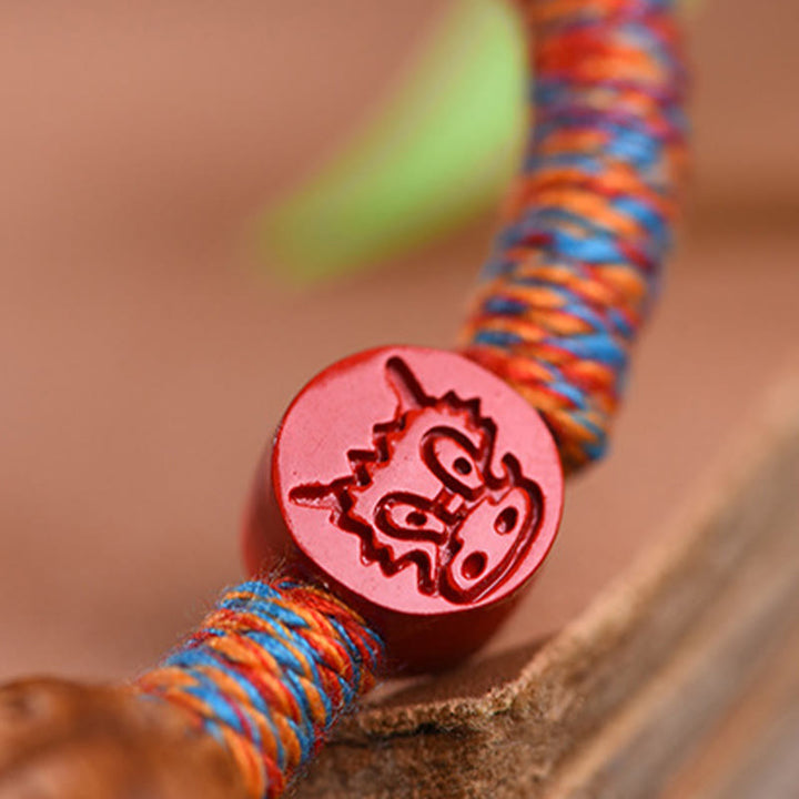 Buddha Stones Ręcznie robione Chińskie Zodiak Czerwony Sznurek Brzoskwiniowy Cynober Bransoletka Szczęścia
