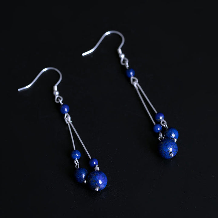 Kolczyki wiszące z Buddha Stones ze srebra próby 925 i koralikami lapis lazuli - image 4