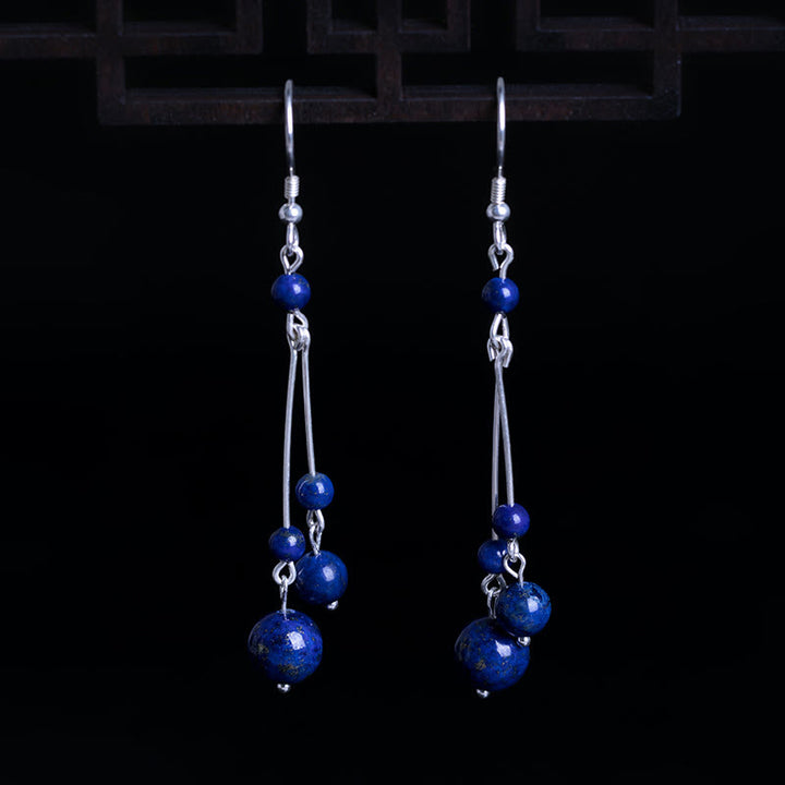 Kolczyki wiszące z Buddha Stones ze srebra próby 925 i koralikami lapis lazuli - image 2