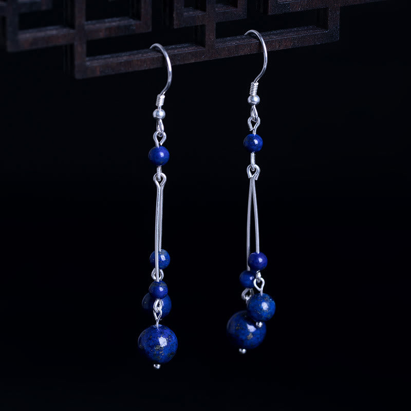 Kolczyki wiszące z Buddha Stones ze srebra próby 925 i koralikami lapis lazuli - Srebro próby 925 - image 0
