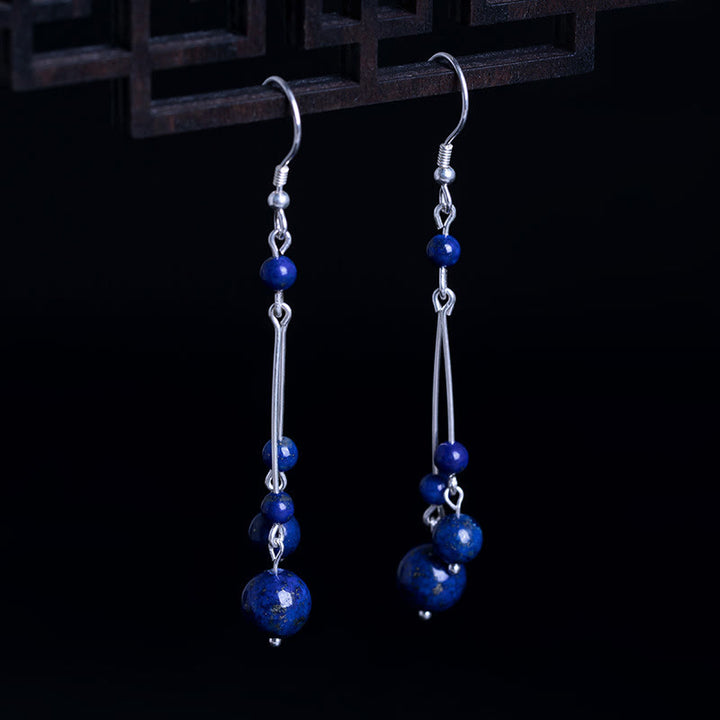 Kolczyki wiszące z Buddha Stones ze srebra próby 925 i koralikami lapis lazuli - Srebro próby 925 - image 0
