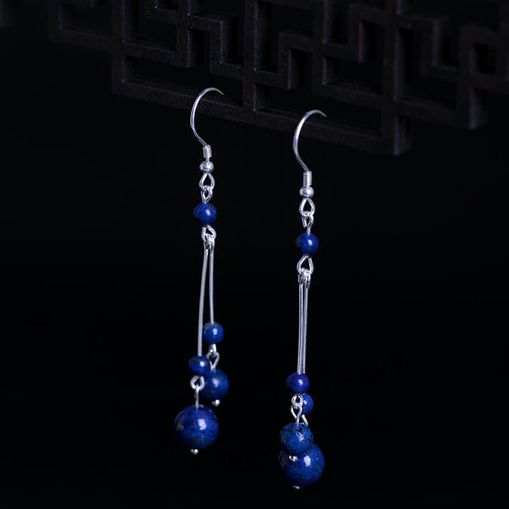Kolczyki wiszące z Buddha Stones ze srebra próby 925 i koralikami lapis lazuli - image 3