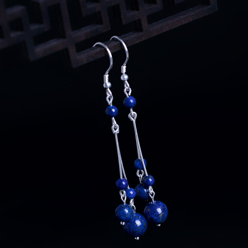 Kolczyki wiszące z Buddha Stones ze srebra próby 925 i koralikami lapis lazuli - image 1