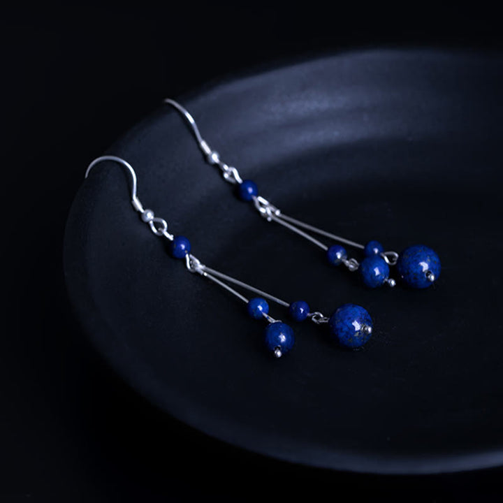Kolczyki wiszące z Buddha Stones ze srebra próby 925 i koralikami lapis lazuli - image 6