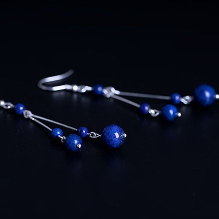 Kolczyki wiszące z Buddha Stones ze srebra próby 925 i koralikami lapis lazuli - image 7