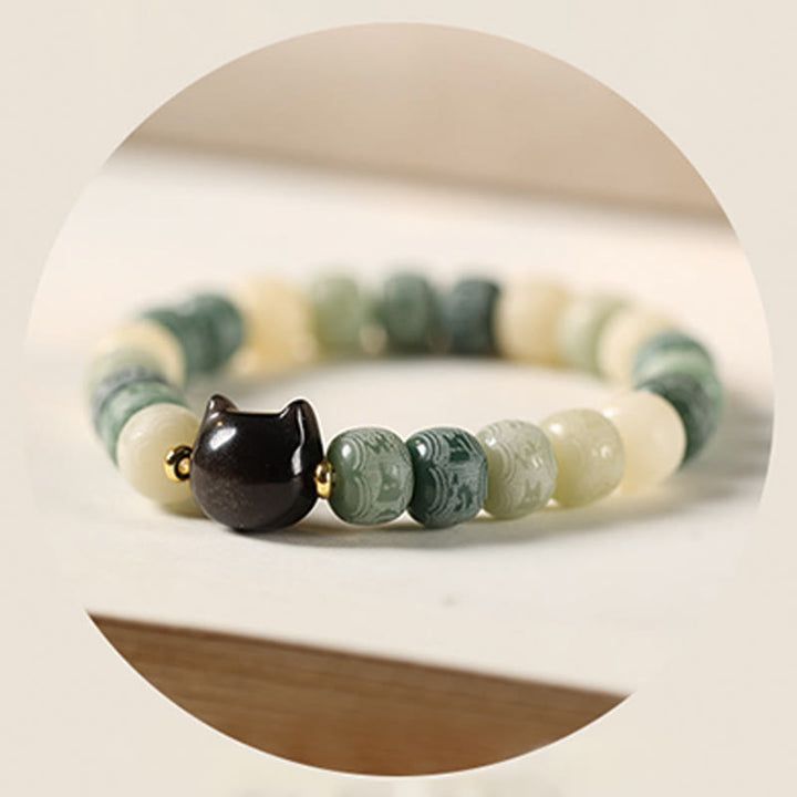 Kamienie Buddha Stones Nasiona Bodhi Om Mani Padme Hum Rzeźbione Srebrne Błyszczące Obsydianowe Głowy Kota Bransoletka Mądrości - image 16