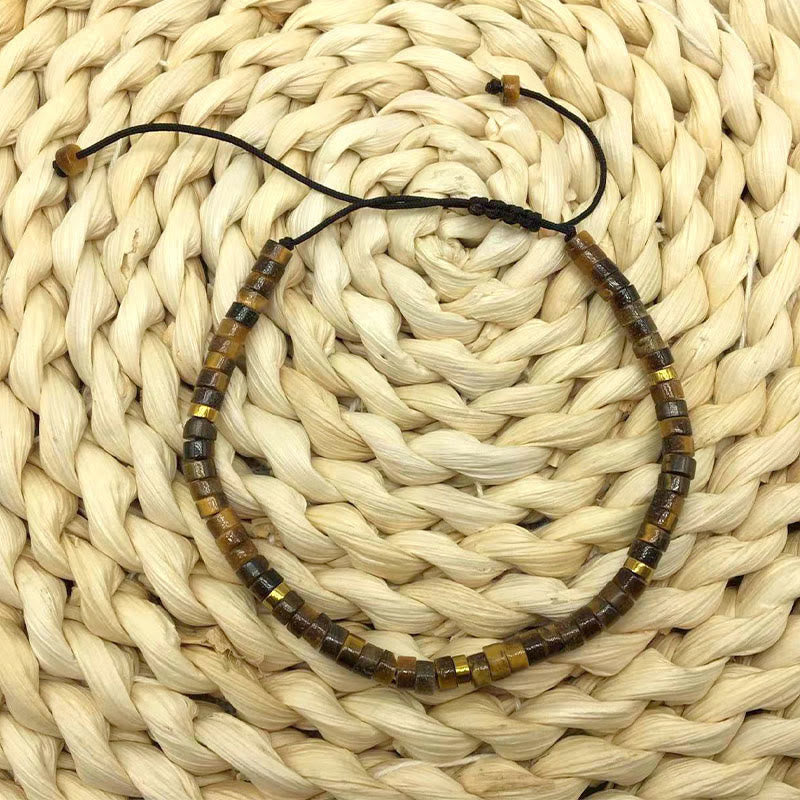Bransoletka z koralików dystansowych Buddha Stones Natural Tiger Eye Courage