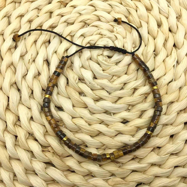 Bransoletka z koralików dystansowych Buddha Stones Natural Tiger Eye Courage