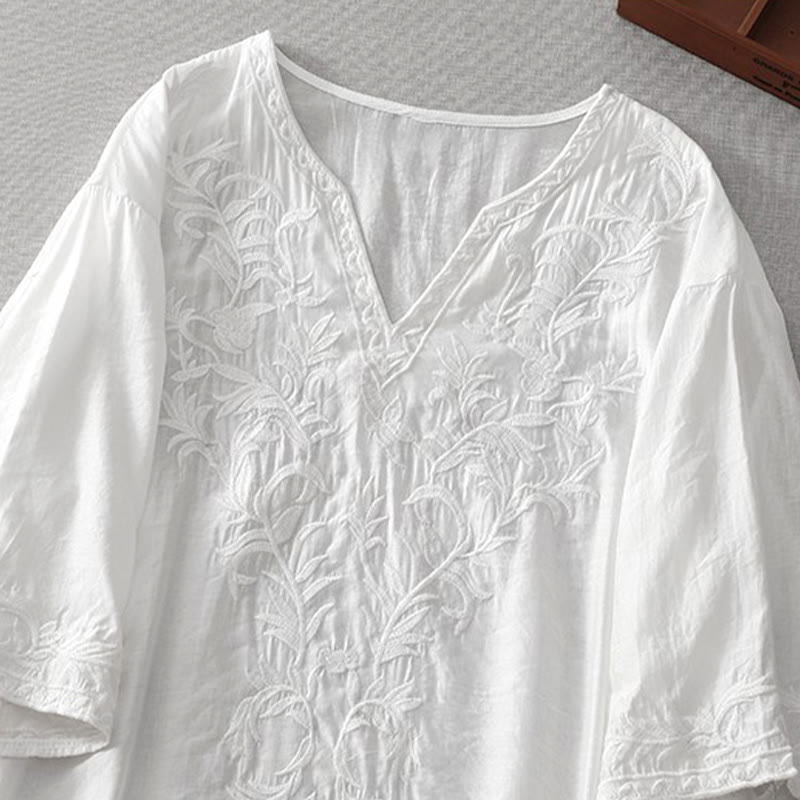 Letnia sukienka midi z haftowanymi liśćmi i kwiatami Buddha Stones w kolorze białym, z krótkim rękawem i dekoltem w serek i kieszeniami - image 3