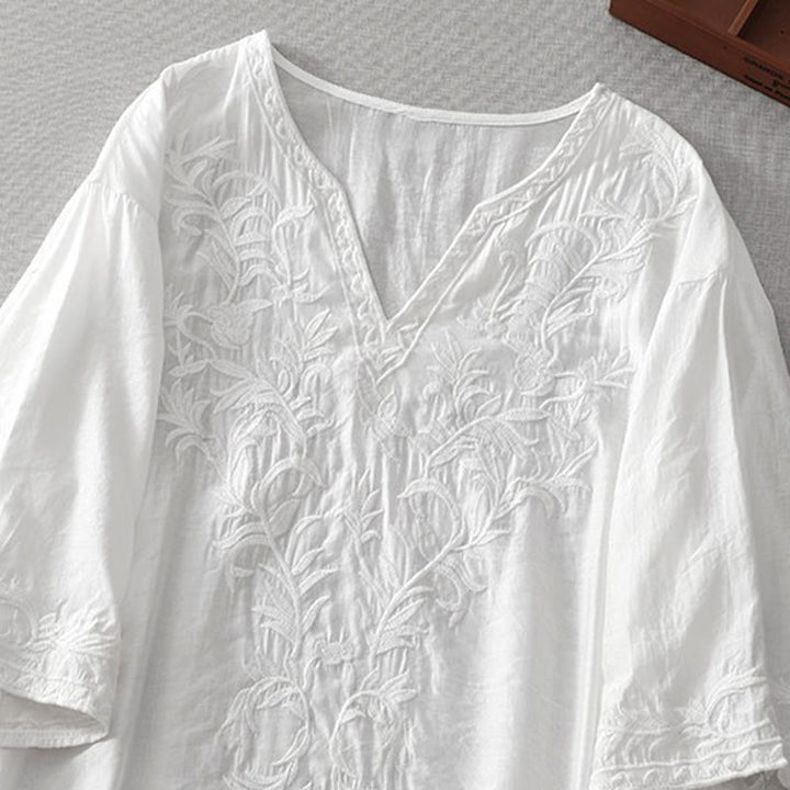 Letnia sukienka midi z haftowanymi liśćmi i kwiatami Buddha Stones w kolorze białym, z krótkim rękawem i dekoltem w serek i kieszeniami - image 3