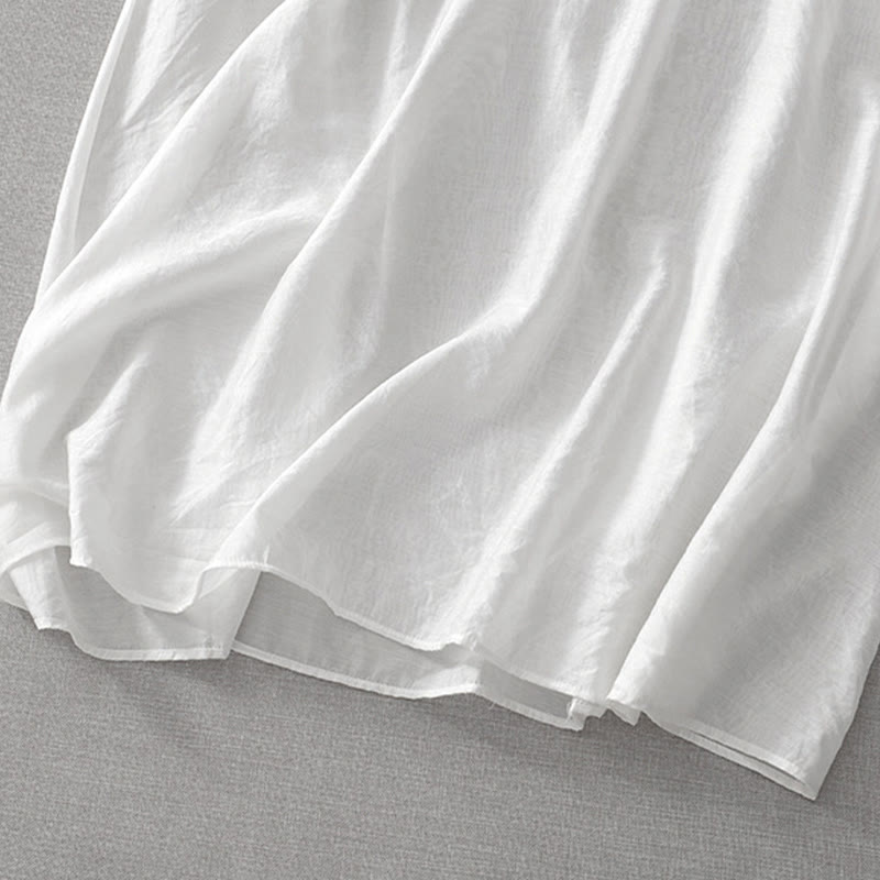 Letnia sukienka midi z haftowanymi liśćmi i kwiatami Buddha Stones w kolorze białym, z krótkim rękawem i dekoltem w serek i kieszeniami - image 11