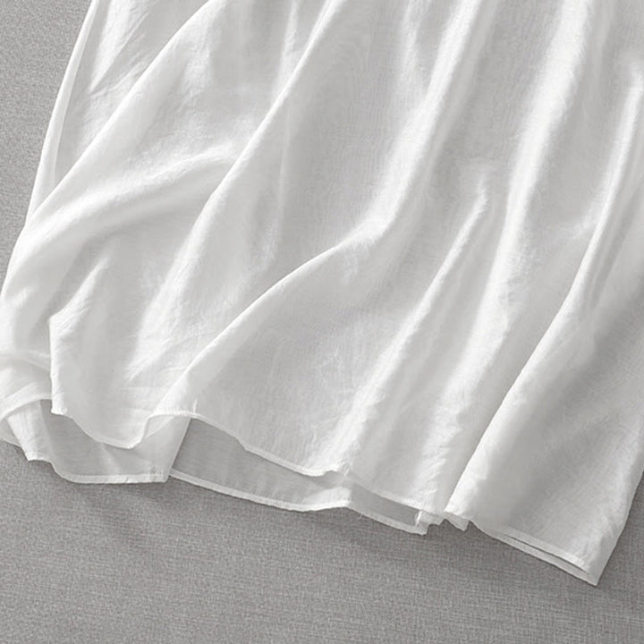 Letnia sukienka midi z haftowanymi liśćmi i kwiatami Buddha Stones w kolorze białym, z krótkim rękawem i dekoltem w serek i kieszeniami - image 11