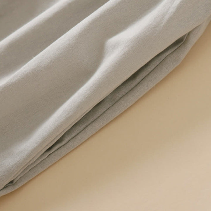 Sukienka midi z krótkim rękawem z bawełny i lnu z kieszeniami i letnimi guzikami Buddha Stones - image 12