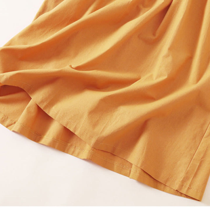 Sukienka midi z krótkim rękawem z bawełny i lnu z kieszeniami i letnimi guzikami Buddha Stones - image 22