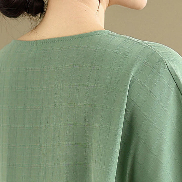 T-shirt damski z nadrukiem Buddha Stones w jednolitym kolorze, z krótkim rękawem i krótkim guzikiem