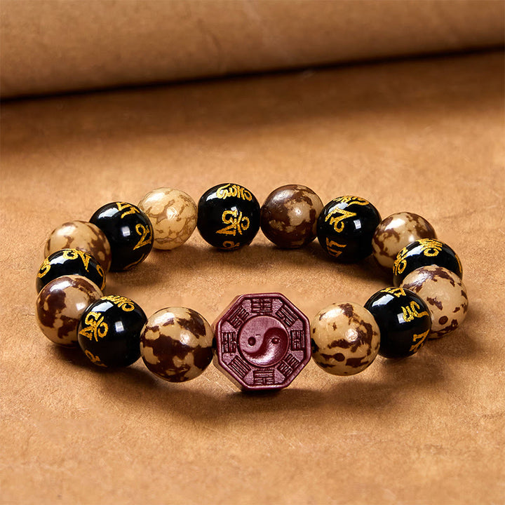 Kamienie Buddha Stones Bodhi Om Mani Padme Hum Bagua Yin Yang Cynober Rzeźbiona Spokojna bransoletka