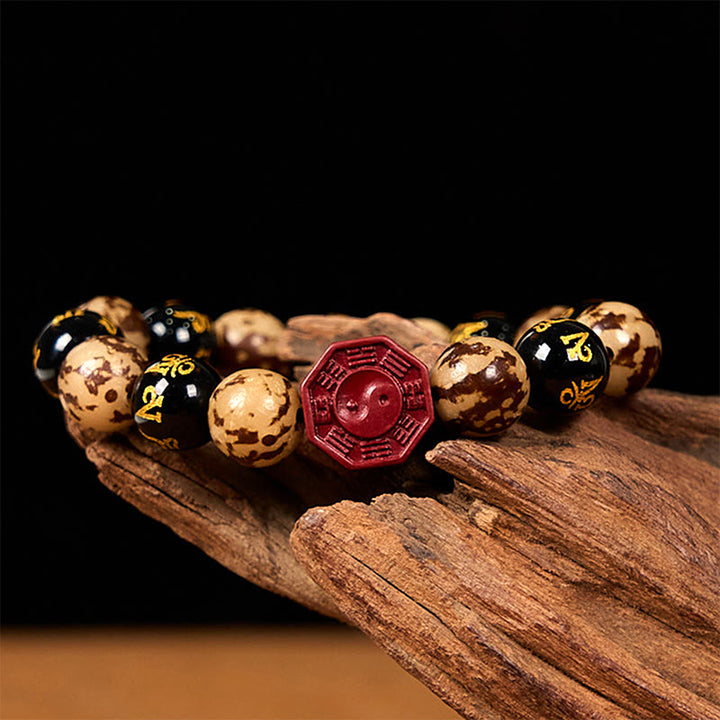 Kamienie Buddha Stones Bodhi Om Mani Padme Hum Bagua Yin Yang Cynober Rzeźbiona Spokojna bransoletka