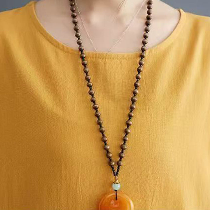 Sukienka midi z bawełny i lnu z krótkim rękawem i nadrukiem "Buddha Stones" w kolorze letnich kamieni, z wzorem feniksa - image 11