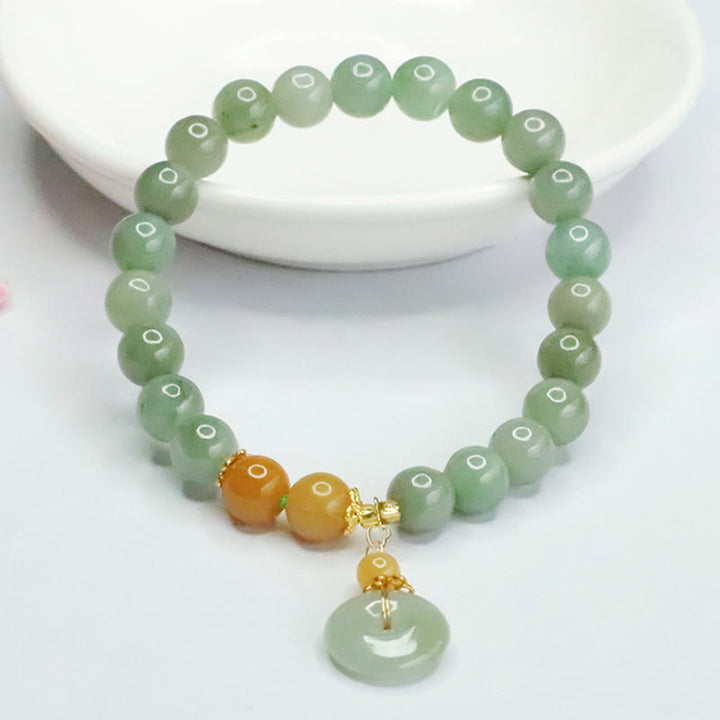 Bransoletka z jadeitu z Buddha Stones i klamrą pokoju, dobrobytu i obfitości