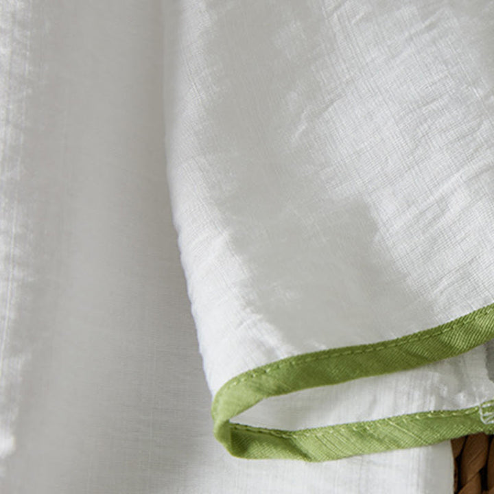 Koszula z bawełny lnianej z haftem w kwiaty w stylu casual dla kobiet zapinana na guziki żaby i kołnierzykiem skośnym - image 5