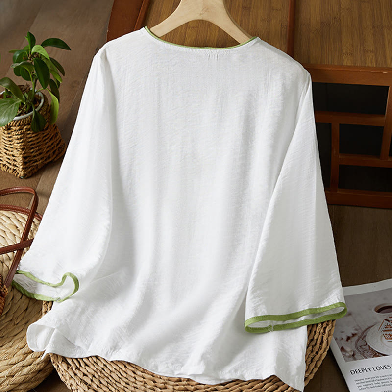 Koszula z bawełny lnianej z haftem w kwiaty w stylu casual dla kobiet zapinana na guziki żaby i kołnierzykiem skośnym - image 1